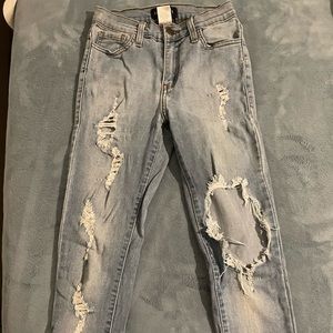 High rise skinny jeans with rips. Fashionova brand